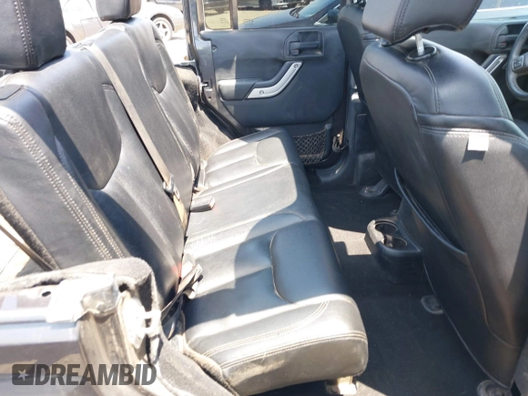 2016 Jeep Wrangler Unlimited Sahara with VIN 1C4HJWEG2GL273507, listed as a IAAI auction lot 39855004 with 87,011 mi miles and . Bid and sale history available at DreamBid. Image 8.