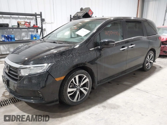 2023 Honda Odyssey Touring z VIN 5FNRL6H85PB039450, wystawiony jako IAAI lot #41504351 z przebiegiem 51 000 mil mil oraz . Historia ofert i sprzedaży dostępna na DreamBid. Obrazek 17.