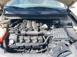 2010 Chrysler Sebring Touring with VIN 1C3BC5ED7AN142671, listed as a IAAI auction lot 42021533 with 115,098 mi miles and . Bid and sale history available at DreamBid. Image 10.