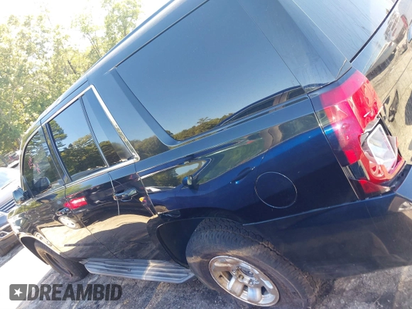 2015 Chevrolet Tahoe Commercial with VIN 1GNLC2EC3FR280365, listed as a IAAI auction lot 40580594 with 195,740 mi miles and . Bid and sale history available at DreamBid. Image 14.