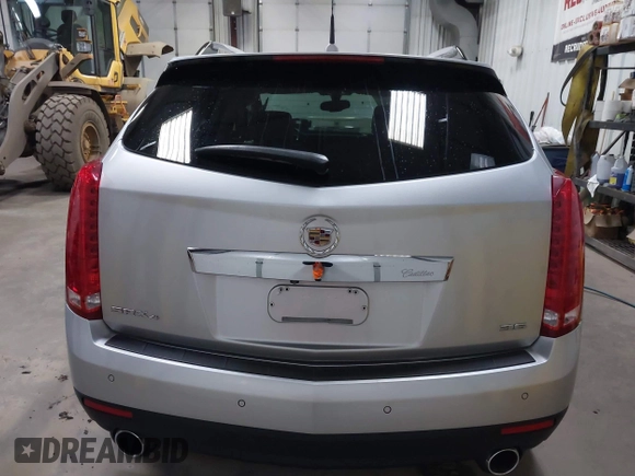 2014 Cadillac SRX Luxury Collection z VIN 3GYFNEE36ES679505, wystawiony jako IAAI lot #41817608 z przebiegiem 62 351 mil mil oraz . Historia ofert i sprzedaży dostępna na DreamBid. Obrazek 16.