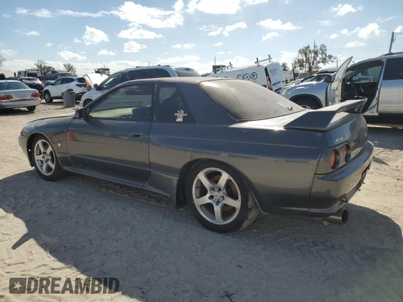 1990 Nissan Skyline z VIN BNR32010431, wystawiony jako Copart lot #78496994 z przebiegiem 182 401 mil mil oraz Nie do naprawy • Non repairable. Historia ofert i sprzedaży dostępna na DreamBid. Obrazek 2.