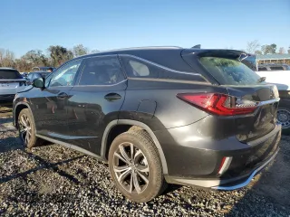2021 Lexus RX 350L with VIN JTJHZKEA1M2021324, listed as a Copart auction lot 79802474 with 84,221 mi miles and Salvage title. Bid and sale history available at DreamBid. Image 2.