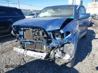 2018 Toyota Tacoma SR with VIN 3TMCZ5AN7JM128860, listed as a IAAI auction lot 41251397 with 97,246 mi miles. Bid and sale history available at carsss.com. Image 6.