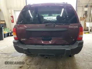 2001 Jeep Grand Cherokee Laredo z VIN 1J4GW48S11C609344, wystawiony jako Copart lot #59258245 z przebiegiem 162 141 mil mil oraz Szkoda całkowita • Salvage title. Historia ofert i sprzedaży dostępna na DreamBid. Obrazek 6.