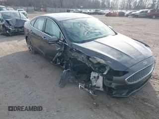 2019 Ford Fusion Hybrid Titanium with VIN 3FA6P0RU9KR158129, listed as a IAAI auction lot 41717104 with 37,736 mi miles. Bid and sale history available at carsss.com. Image 1.