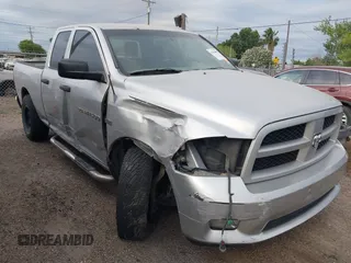 2012 Ram 1500 Express with VIN 1C6RD6FT8CS330842, listed as a IAAI auction lot 41944892 with 112,115 mi miles and . Bid and sale history available at DreamBid. Image 1.