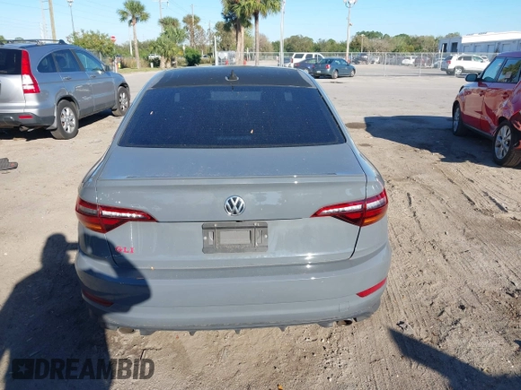2019 Volkswagen Jetta GLI S z VIN 3VW6T7BU5KM169132, wystawiony jako IAAI lot #41599605 z przebiegiem 59 744 mil mil oraz . Historia ofert i sprzedaży dostępna na DreamBid. Obrazek 16.