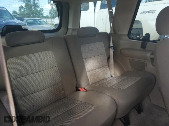 2003 Ford Explorer Sport XLS z VIN 1FMYU60EX3UA56154, wystawiony jako Copart lot #82259834 z przebiegiem 188 417 mil mil oraz Szkody całkowita. Historia ofert i sprzedaży dostępna na DreamBid. Obrazek 11.
