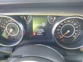 2021 Jeep Wrangler Sport S with VIN 1C4GJXAG3MW737454, listed as a IAAI auction lot 40392262 with 29,330 mi miles and . Bid and sale history available at DreamBid. Image 7.