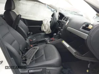 2013 Volkswagen Jetta SE with VIN 3VWDP7AJXDM432740, listed as a IAAI auction lot 42569834 with 118,659 mi miles and . Bid and sale history available at DreamBid. Image 5.
