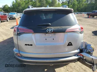2018 Toyota RAV4 XLE with VIN 2T3RFREV5JW731373, listed as a Copart auction lot 51917465 with 124,623 mi miles and Salvage Title. Bid and sale history available at DreamBid. Image 6.