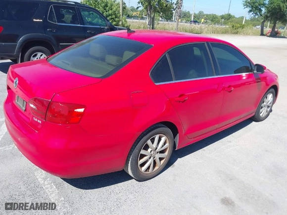 2014 Volkswagen Jetta Sedan SE with VIN 3VWD17AJ2EM217162, listed as a IAAI auction lot 42037161 with 149,971 mi miles. Bid and sale history available at carsss.com. Image 4.