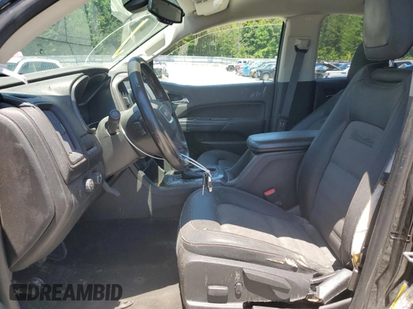 2015 GMC Canyon 4WD SLE with VIN 1GTG6BE32F1115990, listed as a Copart auction lot 71295314 with 118,913 mi miles and Salvage Title. Bid and sale history available at carsss.com. Image 13.