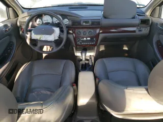 2002 Chrysler Sebring Touring with VIN 1C3AL56R52N240265, listed as a Copart auction lot 77464884 with 119,105 mi miles and Salvage title. Bid and sale history available at DreamBid. Image 8.