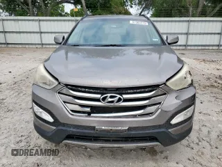 2013 Hyundai Santa Fe Sport z VIN 5XYZU3LB9DG014666, wystawiony jako Copart lot #57304515 z przebiegiem 148 369 mil mil oraz Szkoda całkowita • Salvage title. Historia ofert i sprzedaży dostępna na DreamBid. Obrazek 5.