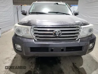 2014 Toyota Land Cruiser z VIN JTMHY7AJ9E4023269, wystawiony jako Copart lot #48291745 z przebiegiem 194 362 mil mil oraz Szkody całkowita. Historia ofert i sprzedaży dostępna na DreamBid. Obrazek 5.