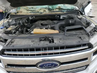 2018 Ford F-150 XL with VIN 1FTEW1EP6JFC13517, listed as a Copart auction lot 57964965 with Not provided miles and Salvage title. Bid and sale history available at DreamBid. Image 11.