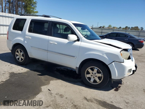 2009 Honda Pilot Touring with VIN 5FNYF48939B039059, listed as a Copart auction lot 50057145 with 218,259 mi miles and Salvage Title. Bid and sale history available at carsss.com. Image 4.