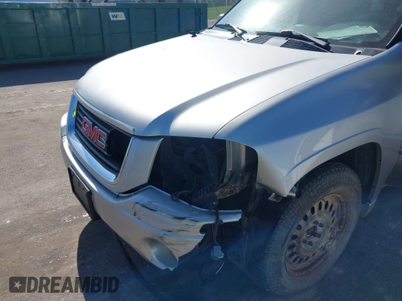 2004 GMC Envoy SLT z VIN 1GKDT13S642449872, wystawiony jako IAAI lot #42236157 z przebiegiem 205 194 mil mil oraz . Historia ofert i sprzedaży dostępna na DreamBid. Obrazek 6.