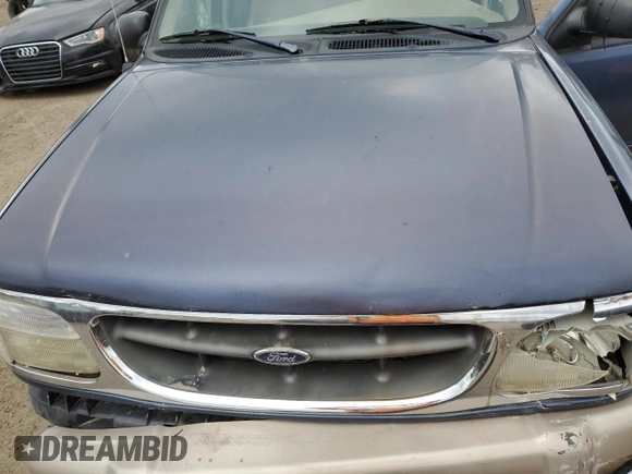 2000 Ford Explorer Eddie Bauer with VIN 1FMZU74E4YZA75510, listed as a Copart auction lot 75601964 with 196,180 mi miles and Salvage title. Bid and sale history available at DreamBid. Image 11.