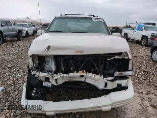 1996 Jeep Grand Cherokee Limited with VIN 1J4GZ78Y0TC185669, listed as a Copart auction lot 79032274 with 184,929 mi miles and Salvage Title. Bid and sale history available at carsss.com. Image 5.