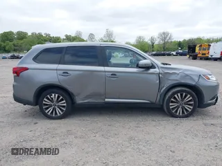 2020 Mitsubishi Outlander SE z VIN JA4AD3A37LZ044719, wystawiony jako IAAI lot #39303659 z przebiegiem 86 662 mil mil oraz . Historia ofert i sprzedaży dostępna na DreamBid. Obrazek 12.