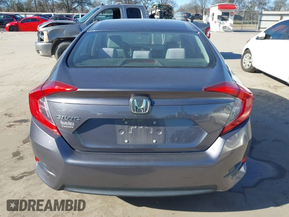 2017 Honda Civic LX z VIN 19XFC2F58HE012626, wystawiony jako IAAI lot #41458898 z przebiegiem 120 354 mil mil oraz . Historia ofert i sprzedaży dostępna na DreamBid. Obrazek 16.