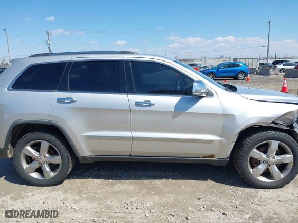 2011 Jeep Grand Cherokee Limited with VIN 1J4RR5GT9BC510322, listed as a IAAI auction lot 42003802 with 211,684 mi miles. Bid and sale history available at carsss.com. Image 13.