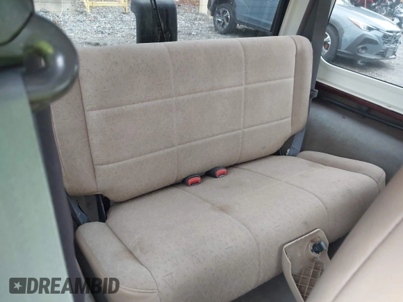 2001 Jeep Wrangler Sport with VIN 1J4FA49S31P301237, listed as a IAAI auction lot 42191884 with 154,627 mi miles and . Bid and sale history available at DreamBid. Image 8.