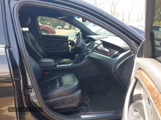 2014 Ford Taurus Limited with VIN 1FAHP2F80EG104984, listed as a IAAI auction lot 41910463 with 174,034 mi miles. Bid and sale history available at carsss.com. Image 5.