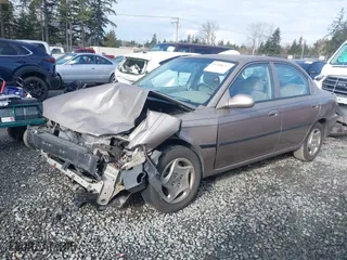 2001 Kia Sephia with VIN KNAFB121815046919, listed as a IAAI auction lot 41398257 with NaN miles. Bid and sale history available at carsss.com. Image 18.
