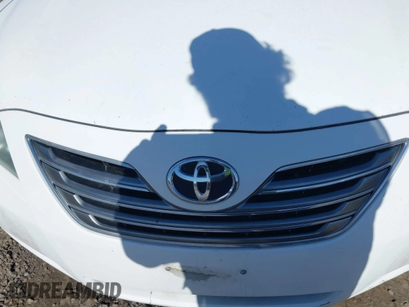 2007 Toyota Camry z VIN 4T1BB46K37U001970, wystawiony jako IAAI lot #41932757 z przebiegiem 255 051 mil mil oraz . Historia ofert i sprzedaży dostępna na DreamBid. Obrazek 6.