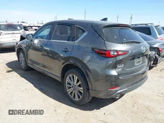 2023 Mazda CX-5 Signature with VIN JM3KFBXY8P0101156, listed as a IAAI auction lot 41670424 with Not Provided miles and . Bid and sale history available at carsss.com. Image 3.