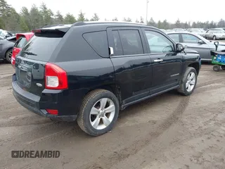 2013 Jeep Compass Latitude with VIN 1C4NJDEB2DD280393, listed as a IAAI auction lot 42028703 with 148,766 mi miles. Bid and sale history available at carsss.com. Image 4.