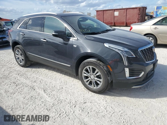 2023 Cadillac XT5 AWD Premium Luxury with VIN 1GYKNDR4XPZ153623, listed as a Copart auction lot 77071324 with 26,292 mi miles and Non Repairable. Bid and sale history available at DreamBid. Image 4.