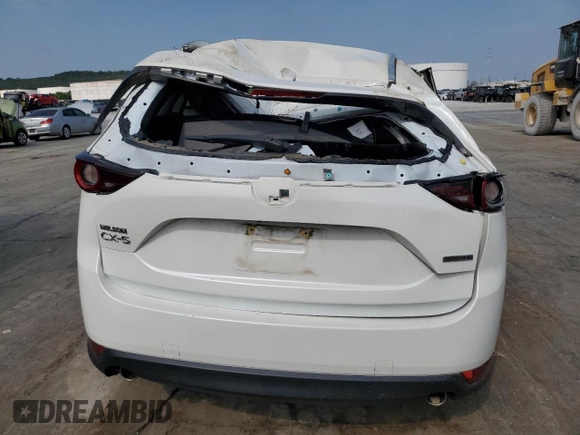 2021 Mazda CX-5 Touring with VIN JM3KFACM1M0405129, listed as a Copart auction lot 67874724 with 49,618 mi miles and Salvage Title. Bid and sale history available at carsss.com. Image 6.