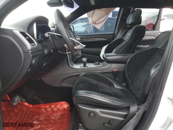 2015 Jeep Grand Cherokee SRT with VIN 1C4RJFDJ8FC919486, listed as a Copart auction lot 76821994 with 114,944 mi miles and Salvage Title. Bid and sale history available at carsss.com. Image 7.