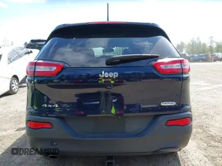 2015 Jeep Cherokee Latitude with VIN 1C4PJMCB0FW702535, listed as a IAAI auction lot 42149898 with 125,938 mi miles and . Bid and sale history available at carsss.com. Image 16.