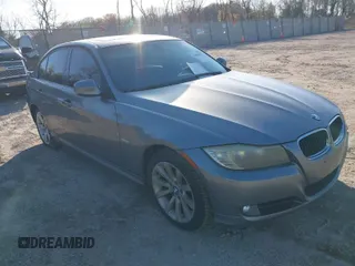 2011 BMW 3 Series 328i with VIN WBAPH5G5XBNM75907, listed as a IAAI auction lot 42002821 with 204,122 mi miles. Bid and sale history available at carsss.com. Image 1.