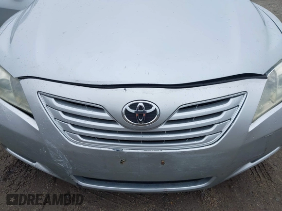 2007 Toyota Camry CE with VIN 4T1BE46K77U101223, listed as a IAAI auction lot 42282044 with 153,807 mi miles and . Bid and sale history available at DreamBid. Image 6.