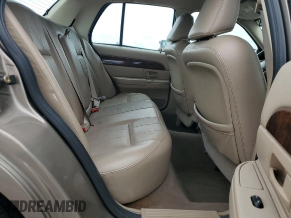 2004 Mercury Grand Marquis LS Premium z VIN 2MEFM75W14X689346, wystawiony jako Copart lot #52676325 z przebiegiem 127 676 mil mil oraz Szkoda całkowita • Salvage title. Historia ofert i sprzedaży dostępna na DreamBid. Obrazek 10.