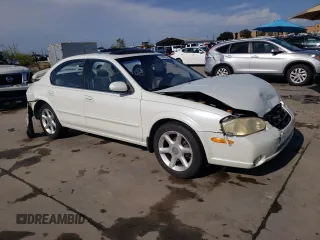 2000 Nissan Maxima GXE z VIN JN1CA31D2YT523871, wystawiony jako Copart lot #65902984 z przebiegiem 235 064 mil mil oraz Szkoda całkowita • Salvage title. Historia ofert i sprzedaży dostępna na DreamBid. Obrazek 4.