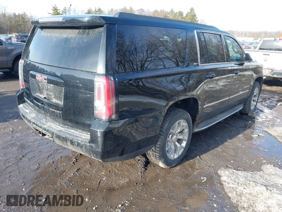 2015 GMC Yukon XL SLT with VIN 1GKS2HKC9FR159164, listed as a IAAI auction lot 41708822 with 136,730 mi miles. Bid and sale history available at carsss.com. Image 4.