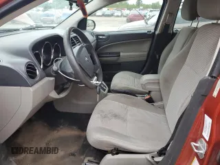 2010 Dodge Caliber Mainstreet z VIN 1B3CB3HA5AD591279, wystawiony jako Copart lot #57794645 z przebiegiem 200 007 mil mil oraz Szkoda całkowita • Salvage title. Historia ofert i sprzedaży dostępna na DreamBid. Obrazek 7.