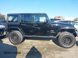 2018 Jeep Wrangler JK Unlimited Sahara with VIN 1C4HJWEG8JL921293, listed as a IAAI auction lot 41413264 with 90,566 mi miles. Bid and sale history available at carsss.com. Image 14.