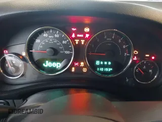 2016 Jeep Wrangler Unlimited Rubicon with VIN 1C4HJWFG4GL127379, listed as a IAAI auction lot 41732688 with 110,193 mi miles. Bid and sale history available at carsss.com. Image 7.