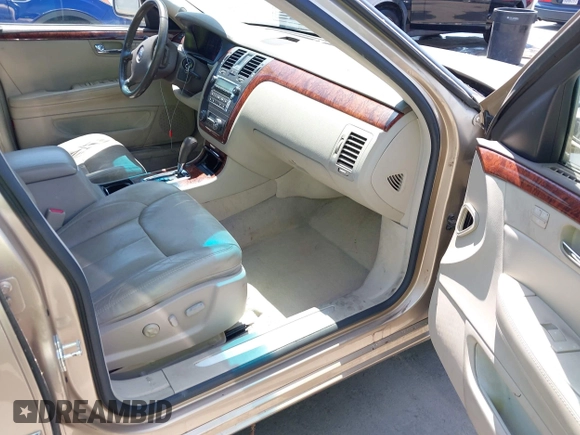 2006 Cadillac DTS w/1SC with VIN 1G6KD57Y26U112518, listed as a IAAI auction lot 42100747 with 122,149 mi miles. Bid and sale history available at carsss.com. Image 5.