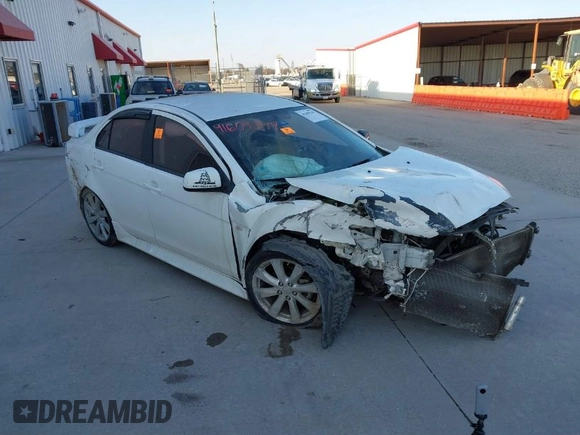 2014 Mitsubishi Lancer GT with VIN JA32U8FWXEU023081, listed as a IAAI auction lot 41609349 with 1 mi miles. Bid and sale history available at carsss.com. Image 1.