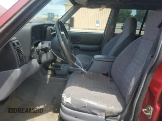 1998 Jeep Cherokee Sport with VIN 1J4FJ68S2WL285432, listed as a Copart auction lot 57183145 with 284,162 mi miles and Clean title. Bid and sale history available at DreamBid. Image 7.